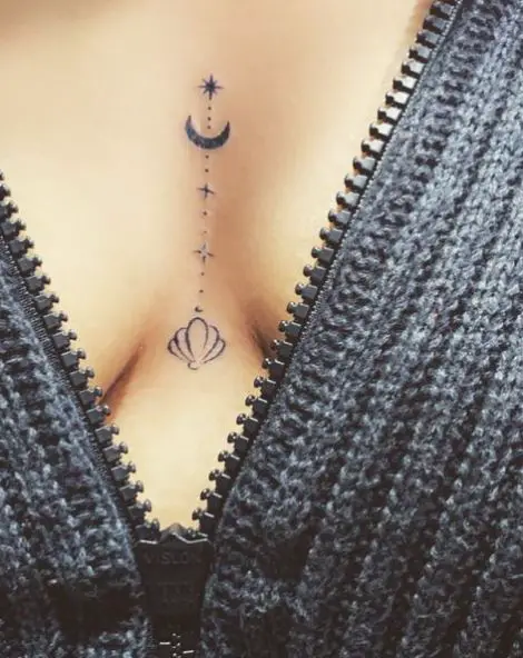 Moon with Star and Seashell Sternum Tattoo