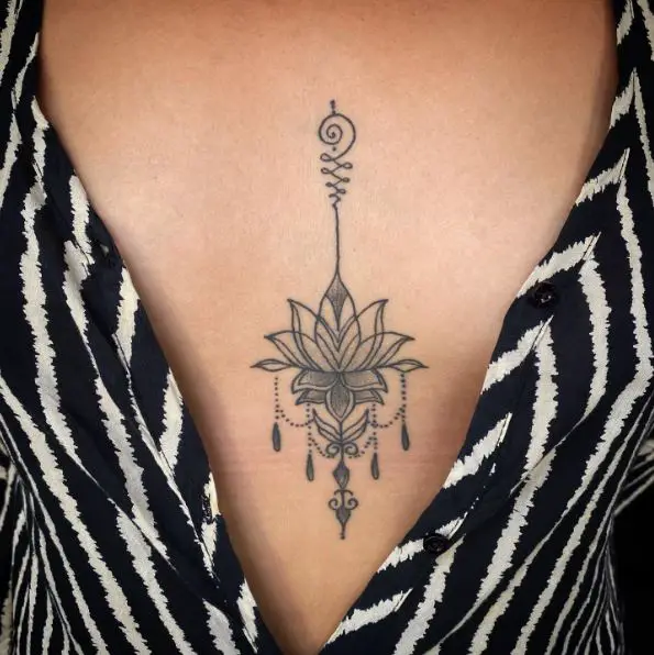 Ornamental Lotus Sternum Tattoo