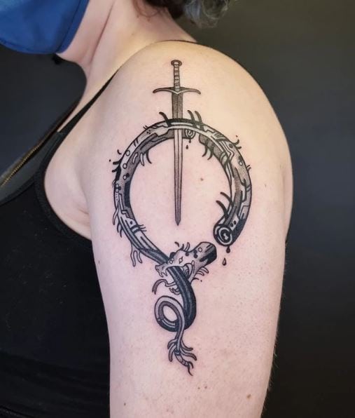 Ouroboros Snake with a Sword Arm Tattoo