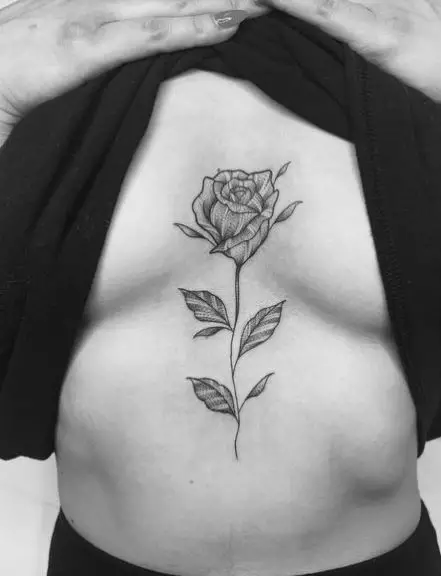 Patterned Rose Sternum Tattoo