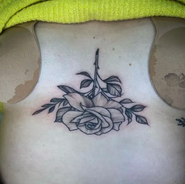 Rose Upside Down Sternum Tattoo
