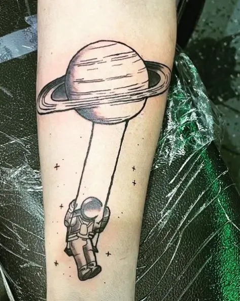 Saturn Swing and Astronaut Tattoo