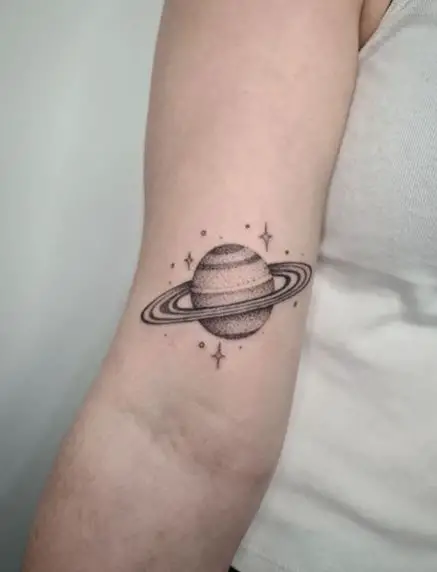 Saturn with Sparks Arm Tattoo