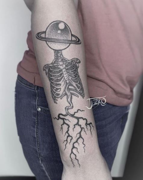 Skeleton Saturn Forearm Tattoo