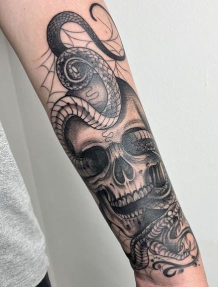 Skull and Snake Forearm Tattoo