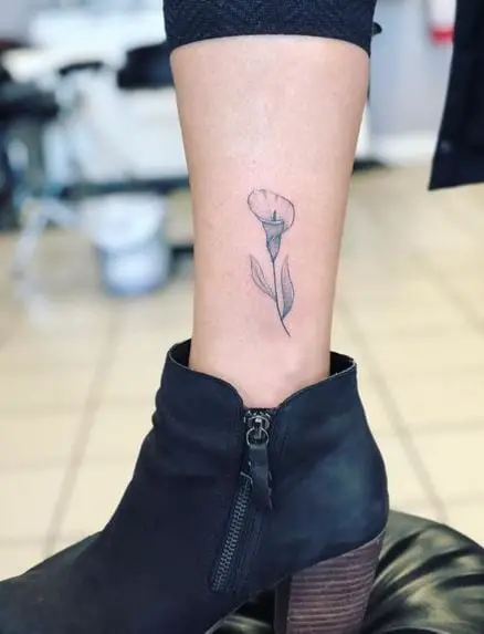Small Greyscale Calla Lily Leg Tattoo