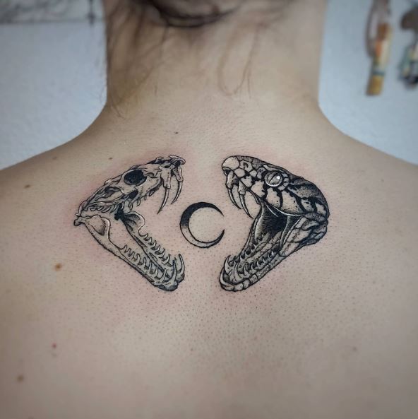 Snake Head and Skull Head Back Tattoo