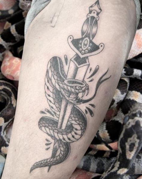 Stabbed Snake Tattoo