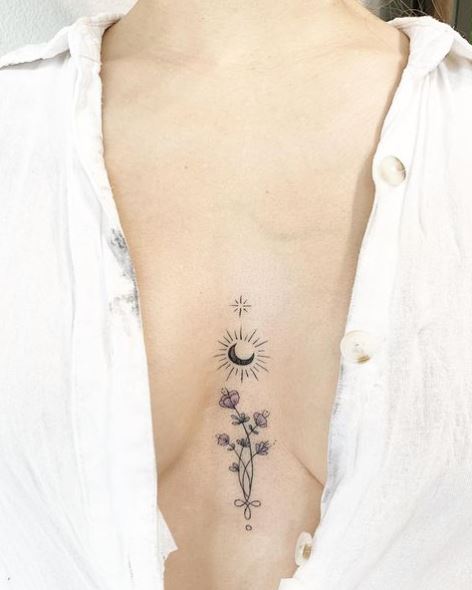 Sun Moon and Star with Flowers Sternum Tattoo