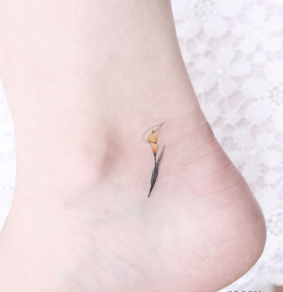 Tiny Yellow Calla Lily Ankle Tattoo