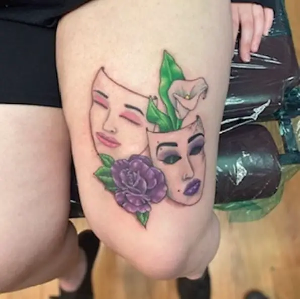 Tragedy Masks and Flowers Thigh Tattoo