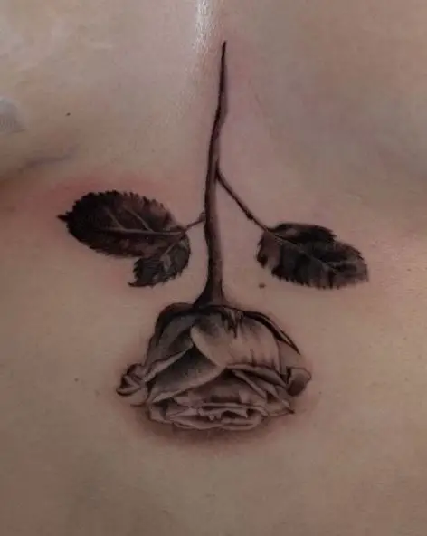 Upside Down Realistic Rose Tattoo on Sternum