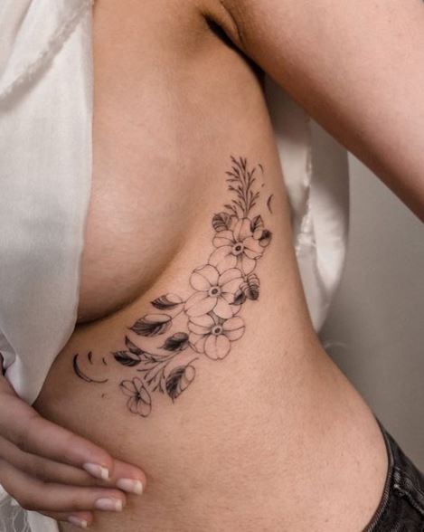 Black and Grey Flowers Ribs Tattoo