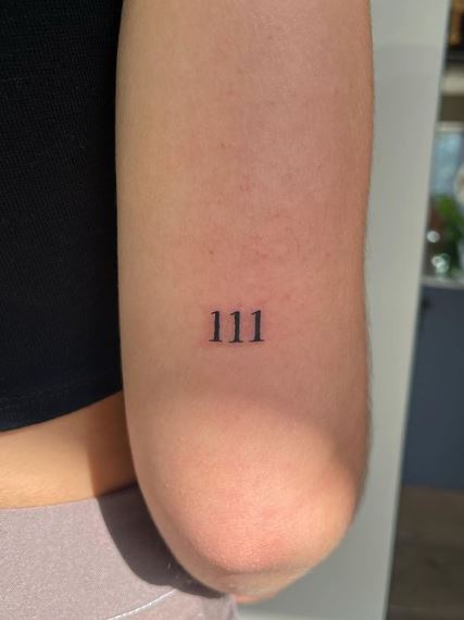 Black 111 Angel Number Elbow Tattoo