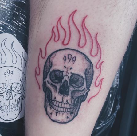 Burning Skull and 999 Forearm Tattoo