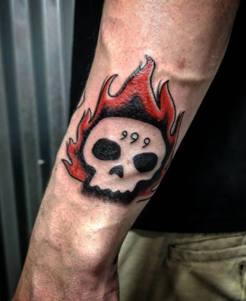 Black and Red Burning Skull and 999 Forearm Tattoo