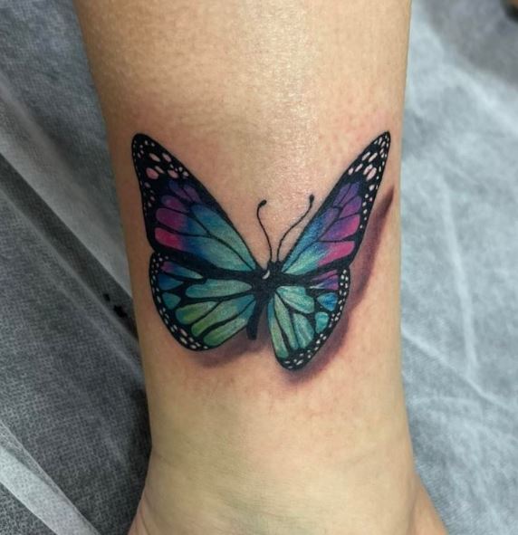 Colorful 3D Butterfly Forearm Tattoo