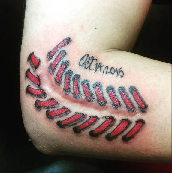 Baseball Seam Stitch with Date Elbow Tattoo