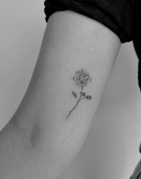 Grey Minimalistic Rose Inner Biceps Tattoo