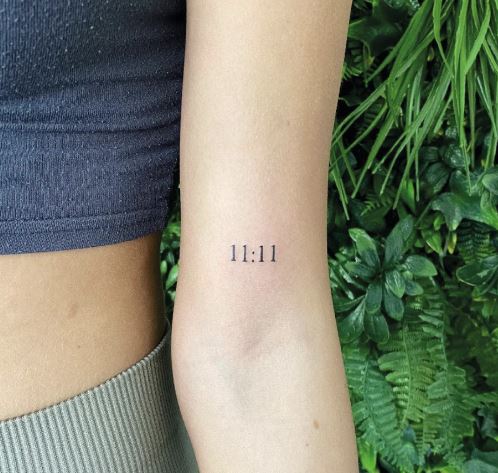 Minimalistic 11:11 Angel Number Arm Tattoo