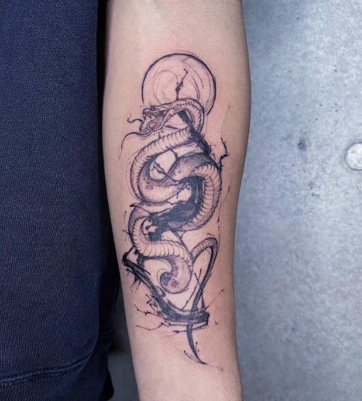 Sketched Black and Grey Snake Forearm Tattoo