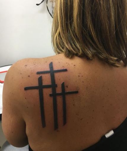 Black Three Cross Back Tattoo