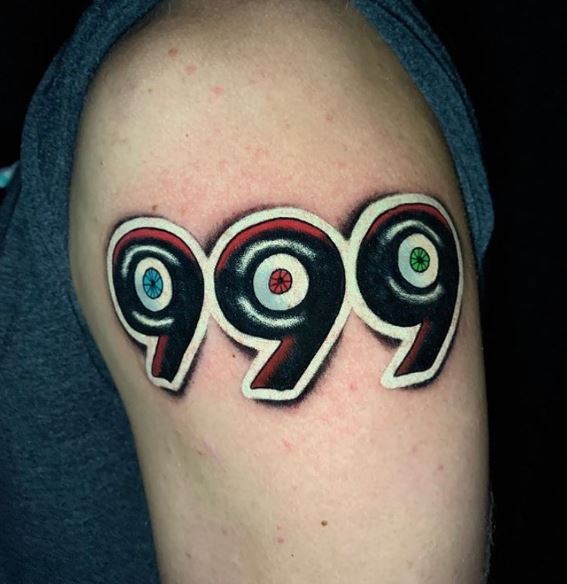 Colored 999 with Eye Balls Arm Tattoo