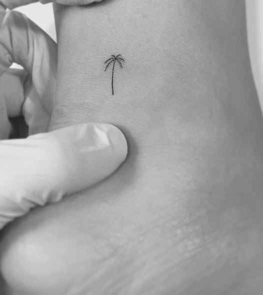 Black Minimalistic Palm Tree Ankle Tattoo