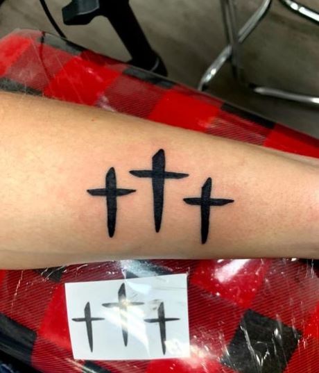 Black Three Cross Forearm Tattoo