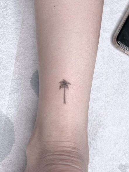 Black Shaded Minimalistic Palm Tree Ankle Tattoo