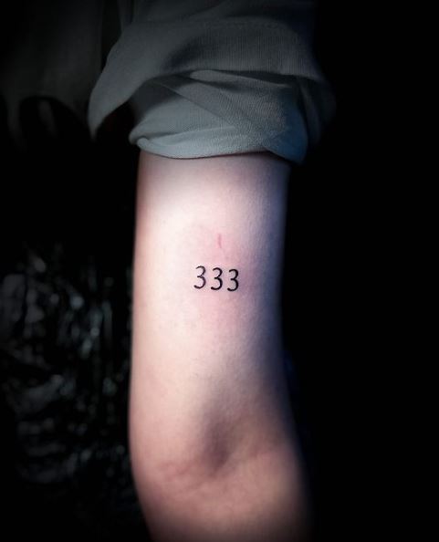 Minimalistic 333 Angel Number Biceps Tattoo