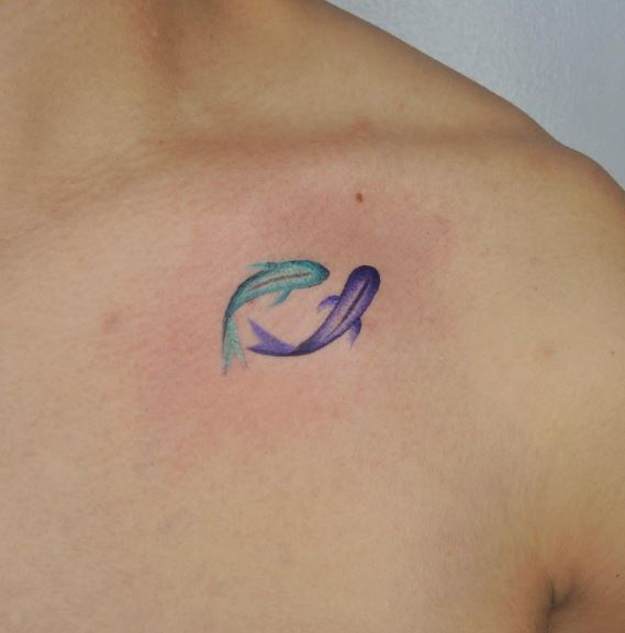 Colored Pair of Koi Fishes Collarbone Tattoo