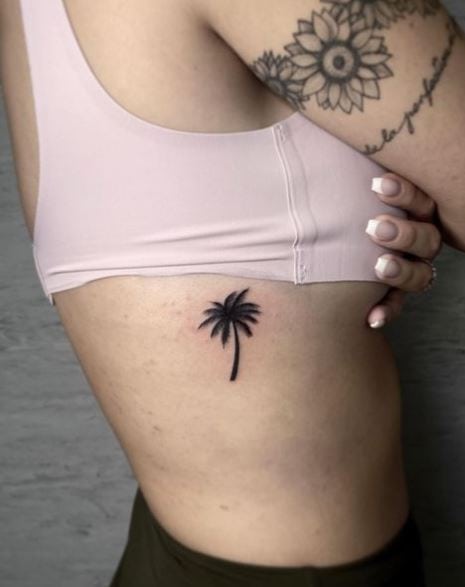 Black Shaded Minimalistic Palm Tree Ribs Tattoo