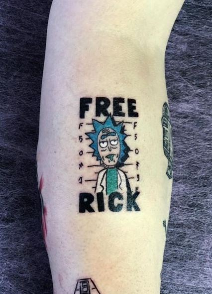 Colored Rick Sanchez with Script Forearm Tattoo