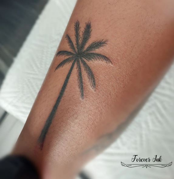 Realistic Black Minimalistic Palm Tree Ankle Tattoo