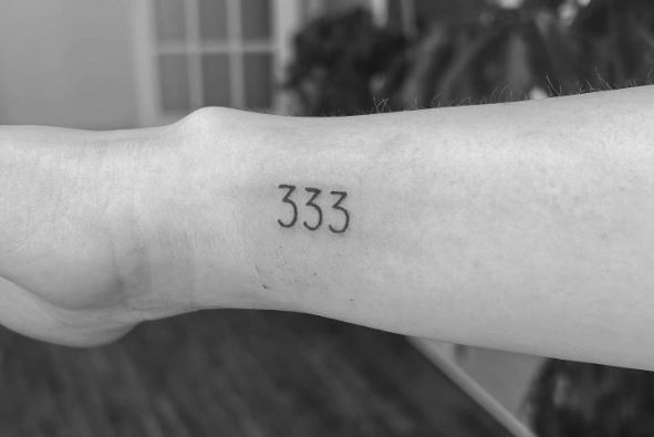 Minimalistic 333 Angel Number Forearm Tattoo