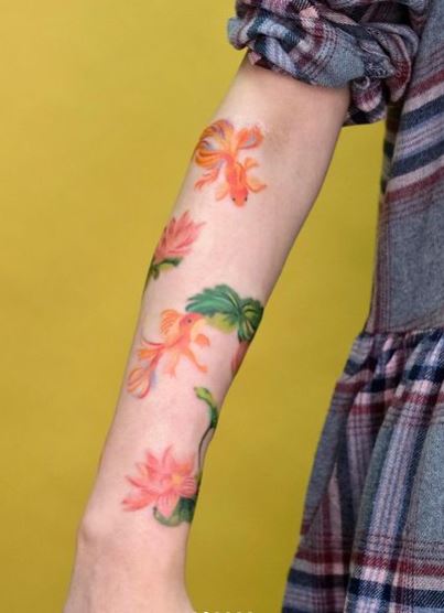 Colorful Lotus Flowers and Fishes Forearm Sleeve Tattoo