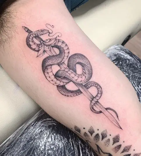 Black and Grey Dagger and Snake Inner Biceps Tattoo