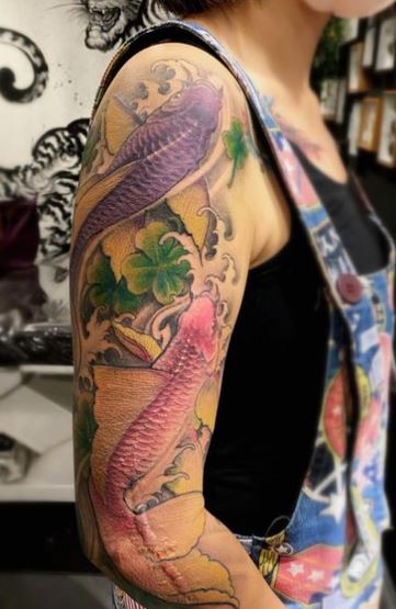 Colorful Koi Fishes Arm Half Sleeve Tattoo