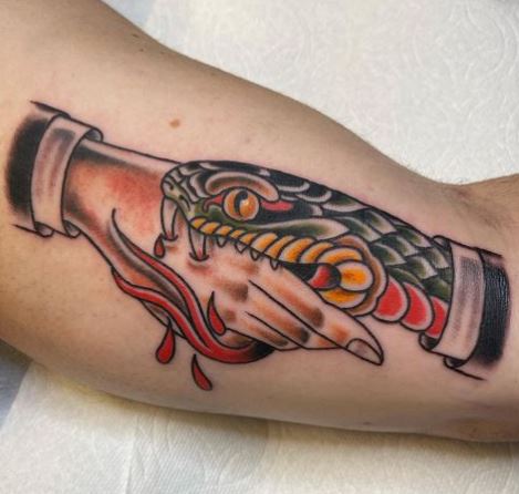 Traditional Hand and Snake Inner Biceps Tattoo