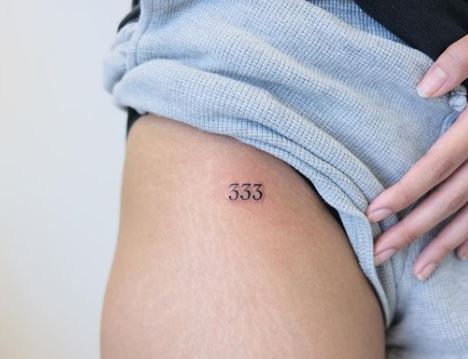 Minimalistic 333 Angel Number Upper Thigh Tattoo