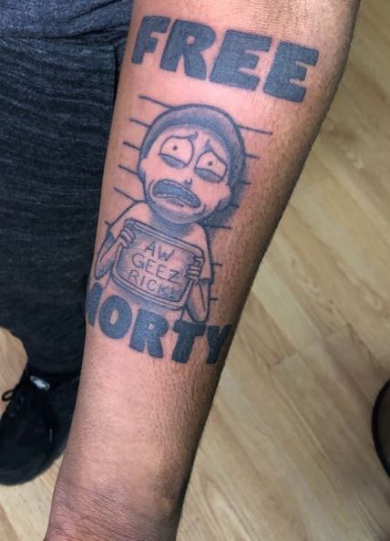 Morty Smith Mug Shot with Script Forearm Tattoo