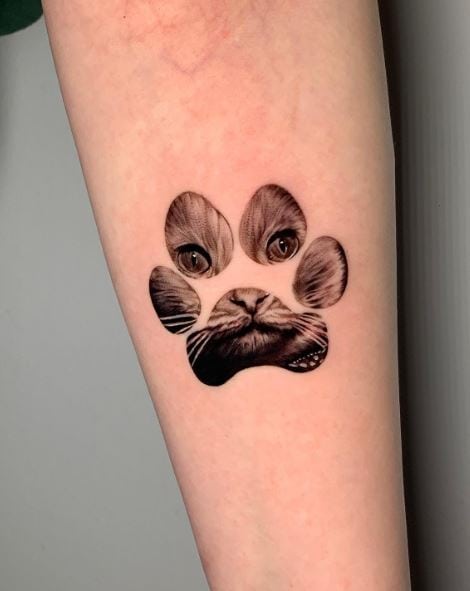 Kitten Face in Paw Print Forearm Tattoo