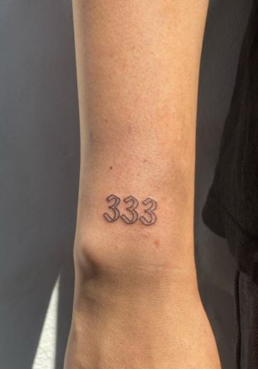 Minimalistic 333 Angel Number Wrist Tattoo