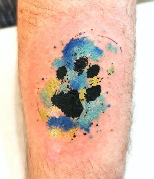 Colored Paw Print Forearm Tattoo