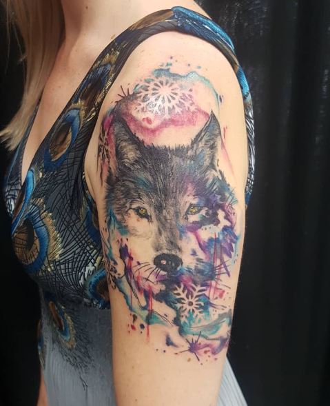 Colored Snowflakes and Wolf Arm Half Sleeve Tattoo
