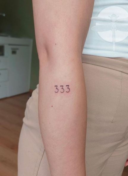 Minimalistic 333 Angel Number Forearm Tattoo