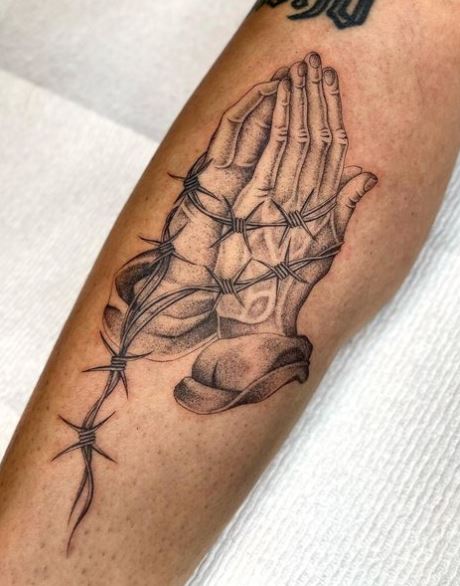 Praying Hands with Barbed Wire Forearm Tattoo