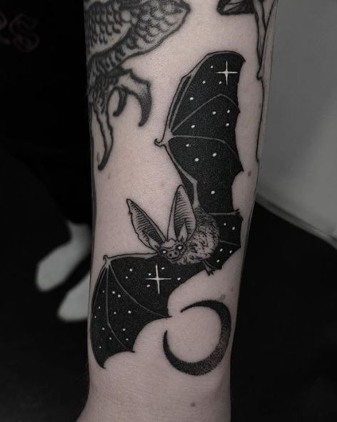 Black Crescent and Gothic Bat Arm Tattoo
