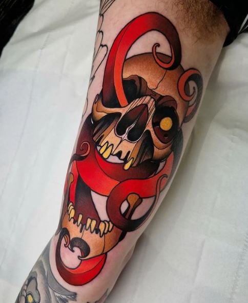 Colorful Neotraditional Skull Inner Biceps Tattoo